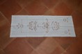 /products/centro-di-cotone-ricamato-a-mano-33x24-con-qualche-rammendino/